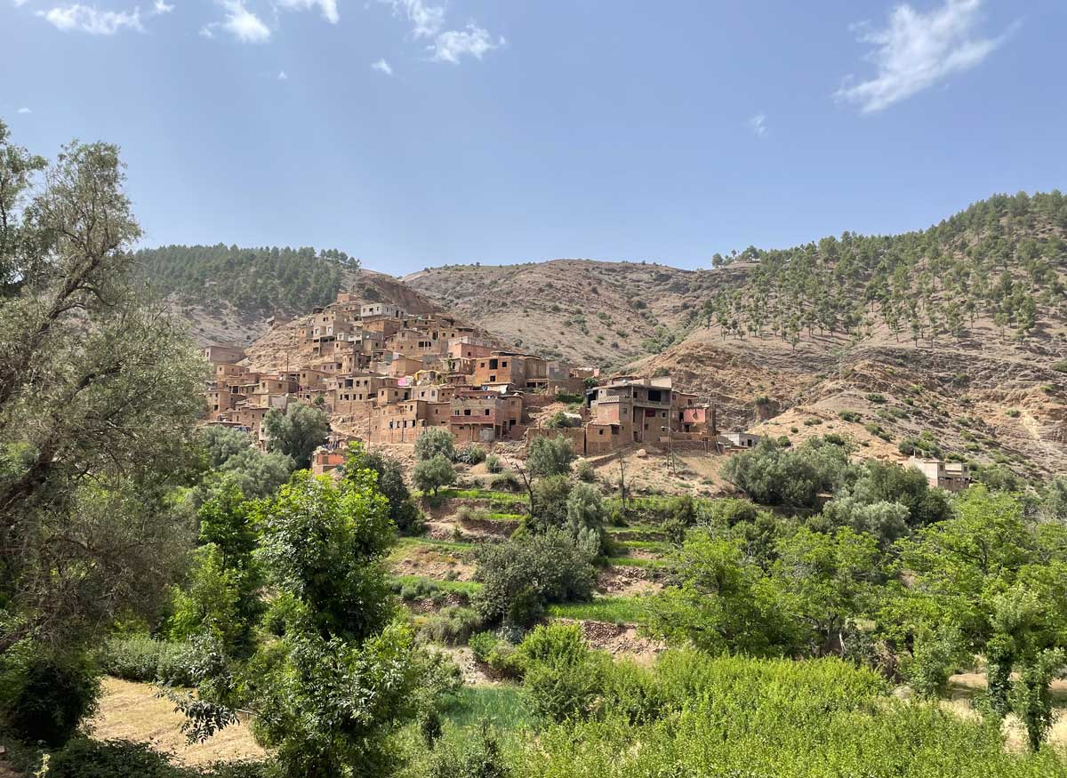 A beautiful old village nestled among orchards in the mountains