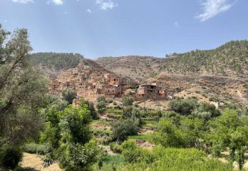 A beautiful old village nestled among orchards in the mountains